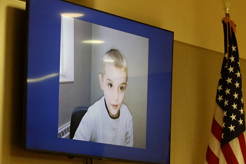 A photograph of AJ Freund is shown on a projector during the trial of former Illinois Department of Children and Family Services employees Carlos Acosta and Andrew Polovin before Lake County Judge George Strickland on Friday, Oct. 13, 2023. Acosta was later convicted while Polovin was cleared. Acosta faces sentencing on June 6, 2024.