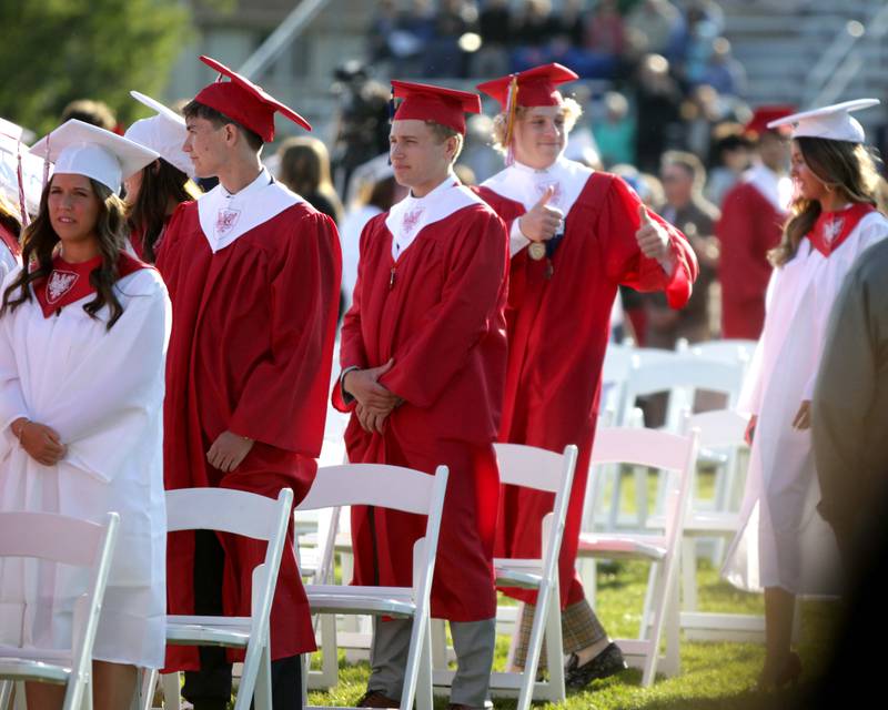 Benet graduates take their seats during the school’s commencement ceremony in Lisle on Thursday, May 25, 2023.