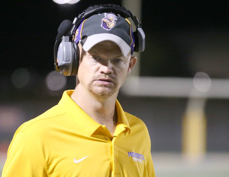 Mendota head football coach Keegan Hill coaches his team against Princeton on Friday, Oct. 11, 2024 at Mendota High School.