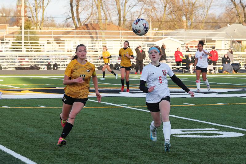 Bradley-Bourbonnais' Haven Fruehling, right, and Herscher's Brooke King race for possession during the Boilermakers' 3-2 loss to Herscher on Tuesday, April 15, 2025.