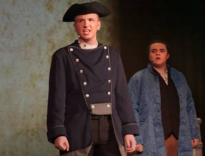 Jaxon Schneider (Javert) and Adrian Silva (Valjean) act out a scene in the musical "Les Miserabels" on Tuesday, March 13, 2024 in Matthiessen Memorial Auditorium at La Salle-Peru Township High School.