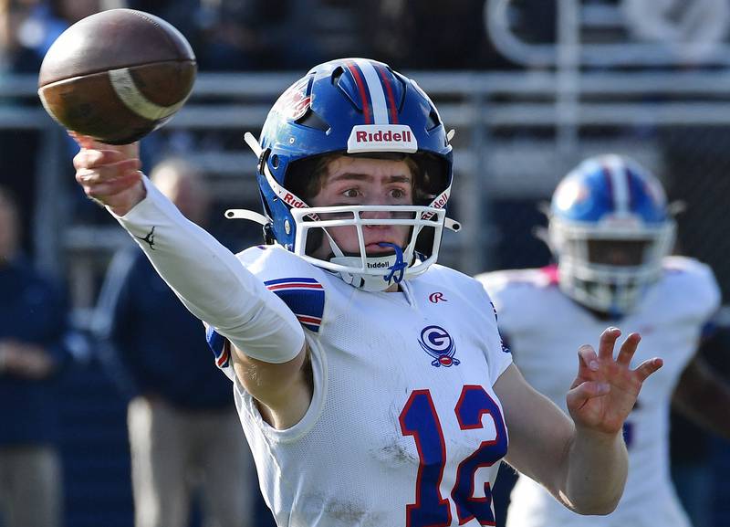 Glenbard South quarterback Michael Champagne fires a short pass during a Class 5A second round game on Nov. 4, 2023 at Nazareth Academy in LaGrange Park.
