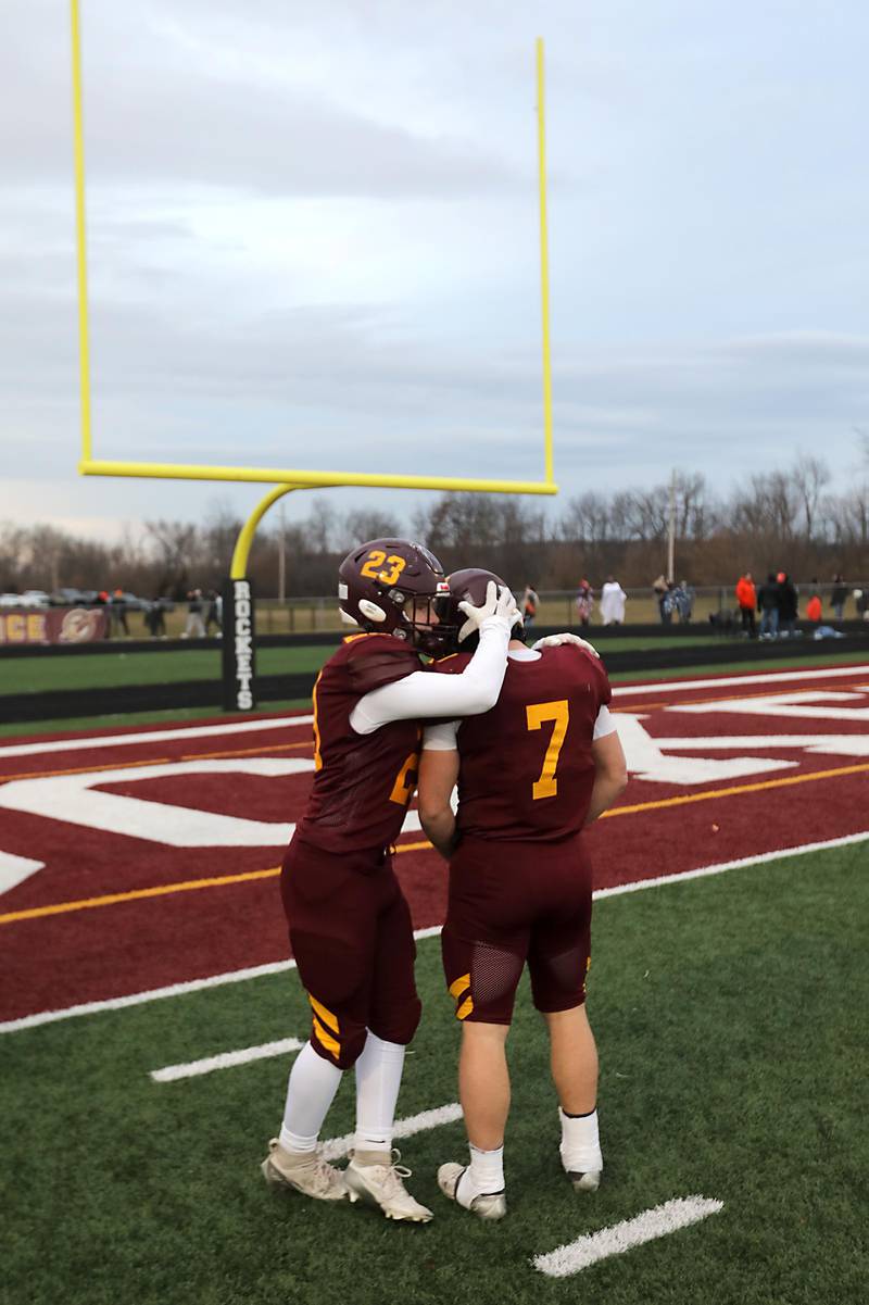 Richmond-Burton’s Ethan Martens hugs his teammate, Blake Livdahl, after Richmond-Burton lost to Byron in an IHSA Class 3A semifinal playoff football game on Saturday, November 22, 2025, at Richmond-Burton High School, in Richmond.