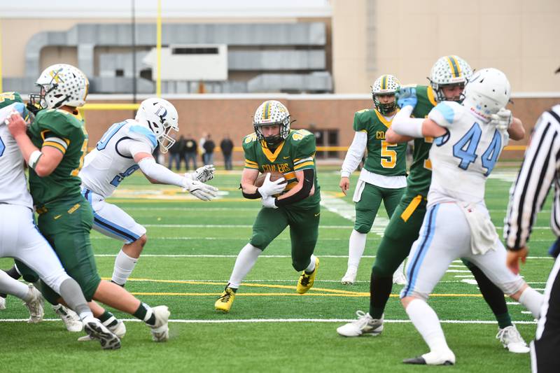 Coal City's Landin Benson maneuvers through the DePaul defense on his way to a touchdown Saturday, Nov. 23, 2024, during the Coalers' 21-14 loss to the Rams in the IHSA Class 4A Playoffs semifinal game.