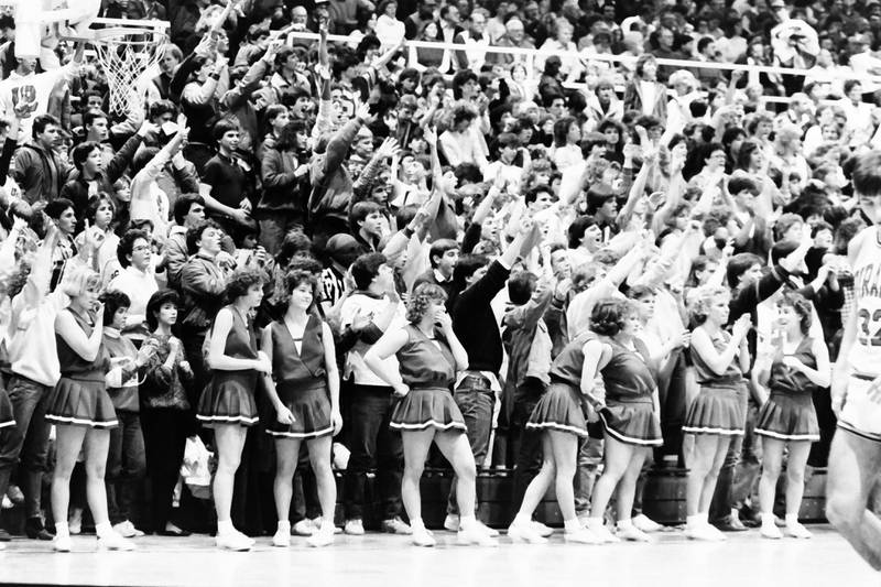 L-P cheerleaders and students cheer during the Regional title game on Saturday, Feb. 28, 1986 at La Salle-Peru Township High School.