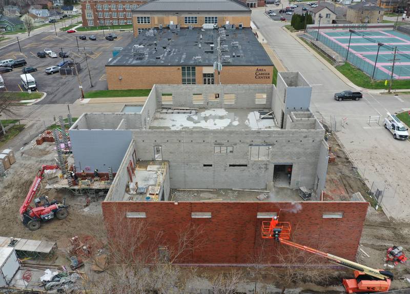 Crews began laying bricks on the exterior wall of the La Salle-Peru Township High School's new Agriculture Center on the southeast corner of Sixth and Creve Coeur streets on Wednesday, April 1, 2026 in La Salle.