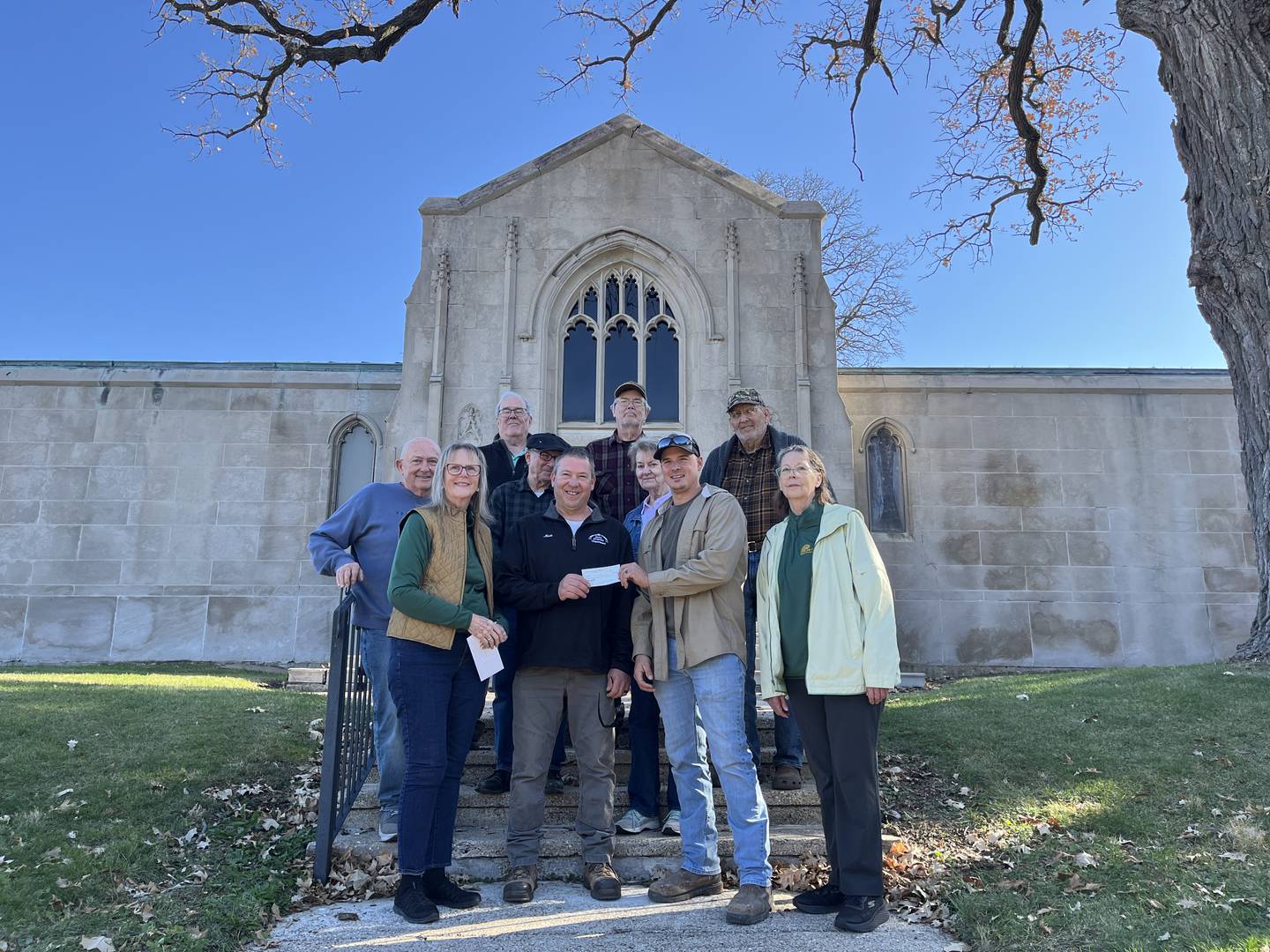 The Lee County Historical and Genealogical Society presented a $1,000 check Nov. 14, 2025, to the city of Dixon to fund restorations to the Oakwood Cemetery Mausoleum.