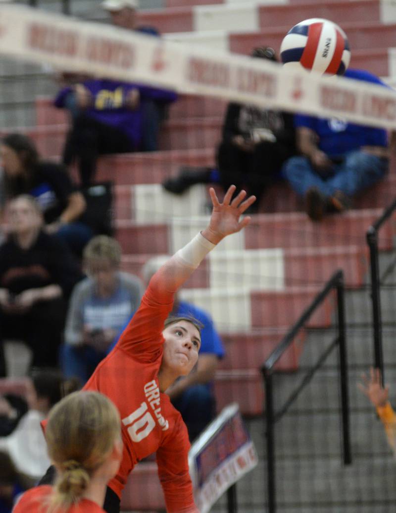 Oregon's Lola Schwarz spikes against West Carroll during the Oregon Varsity Girls Volleyball Tournament on Friday, Sept. 5, 2025 at the Blackhawk Center in Oregon.