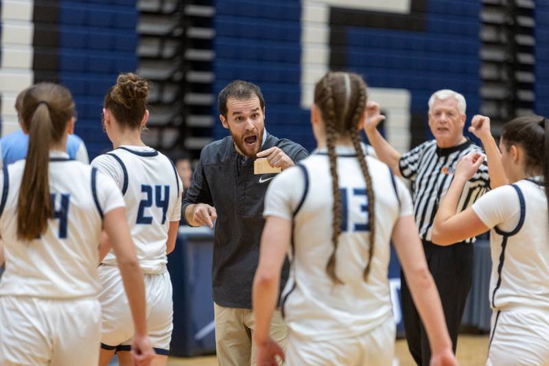 Lake Park's Coach Bob Reibel is fired up with his team against St. Charles East on Wednesday, Jan.7,2026 in Roselle.