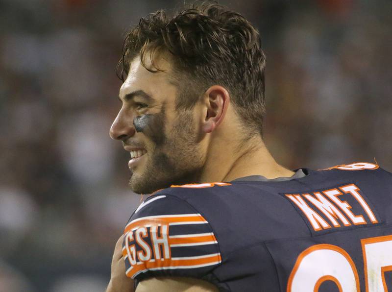 Chicago Bears tight end Cole Kemet,  smiles while watching his team play the Buffalo Bills on Sunday, Aug. 17, 2025 at Soldier Field in Chicago.