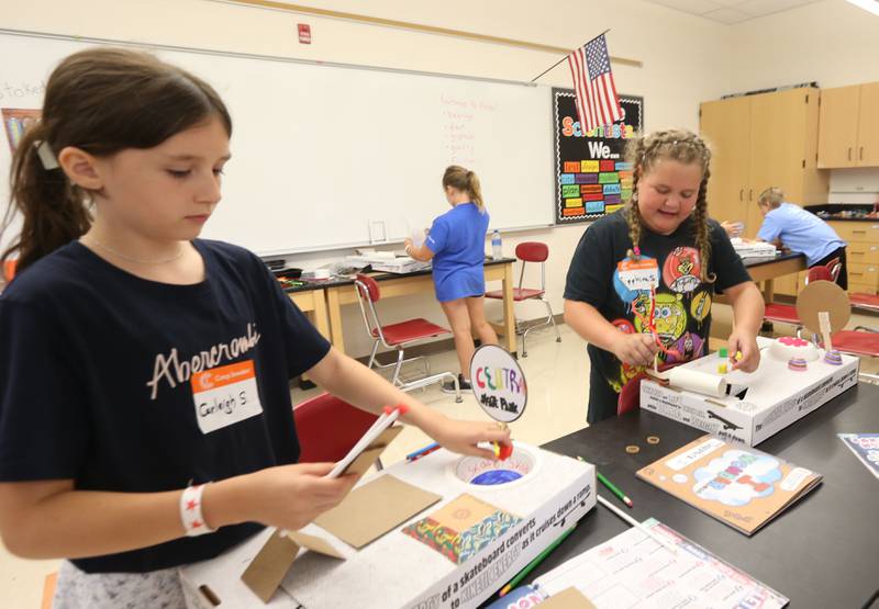 Carleigh S. and Sappphira S. create a mini skate park during Camp Invention at Central Intermediate School on Thursday, June 15, 2023 in Ottawa.