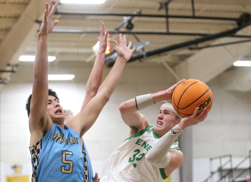 Seneca's Paxton Giertz eyes the hoop as Marquette's Blayden Cassel defends during the Tri-County Conference championship on Friday, Jan. 31, 2025 at Putnam County High School.