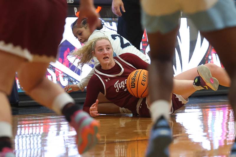 Plainfield North’s looks to pass off the recovered loose ball against Plainfield South on Thursday, Jan 9, 2025.