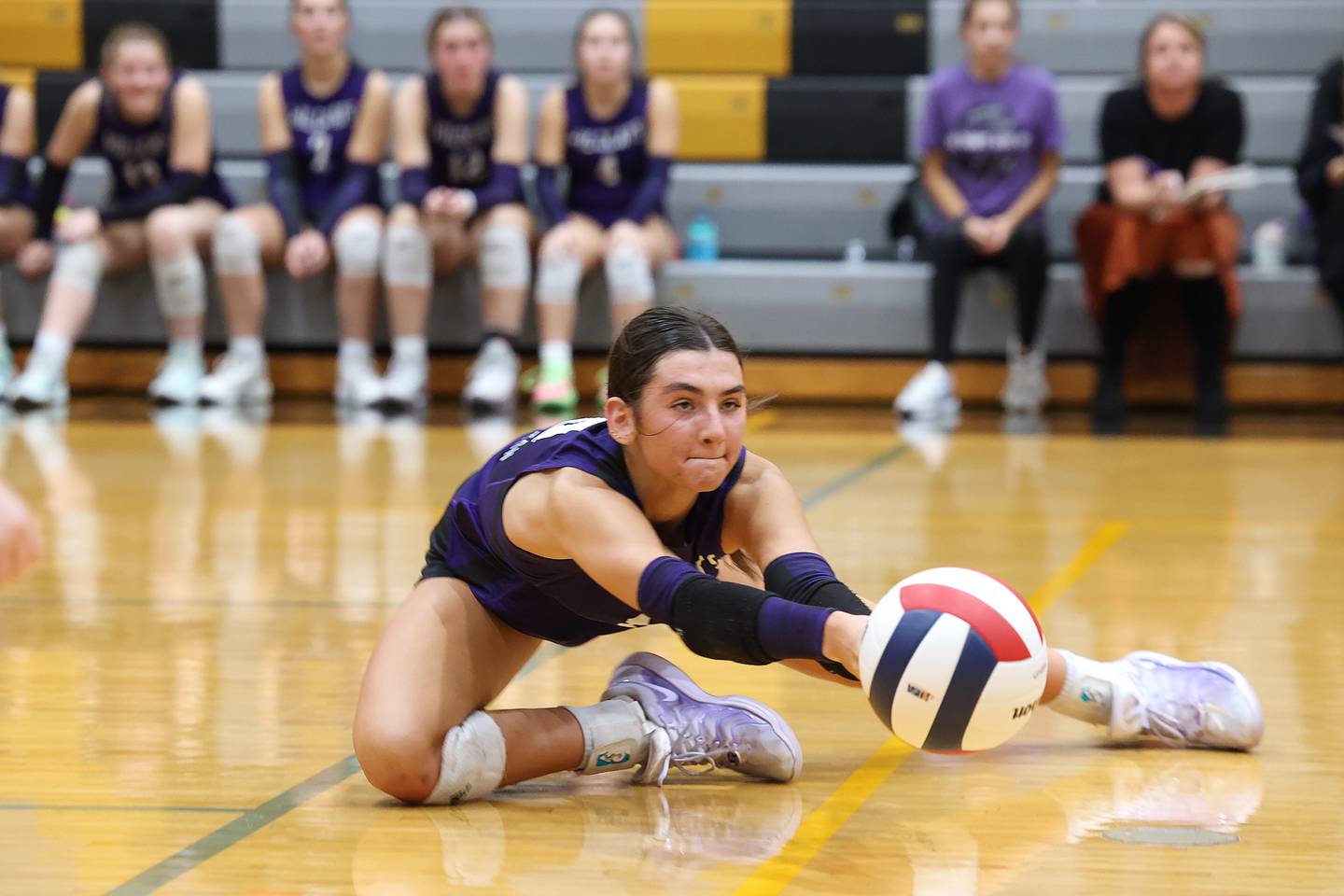 Wilmington's Rachel Smith attempts to save a deflected ball during the Wildcats' loss in three sets, 25-16, 22-25, 17-25, to Pontiac in the IHSA Class 2A Herscher Regional championship on Thursday, Oct. 30, 2025.