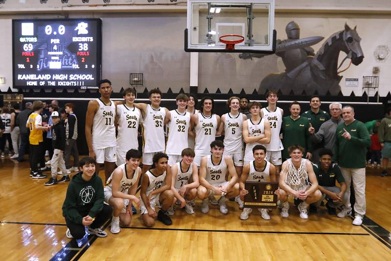 Crystal Lake South poses for a championship picture after they defeated Kaneland in the IHSA Class 3A Kaneland Boys Basketball Sectional championship game on Friday, March 1, 2024, at Kaneland High School in Maple Park.