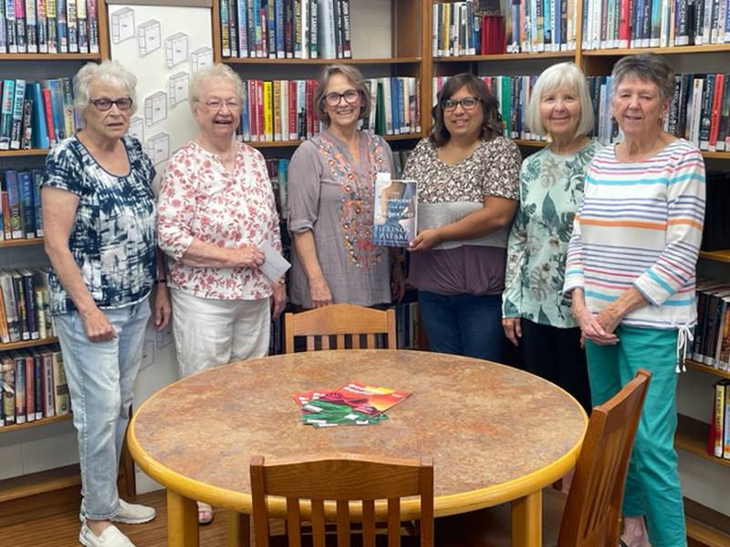 Present at the gifting of the book was Barbara McKanna, Judy Glaser, Barbara Haurberg, Librarian Jaclyn Trujillo, Lois Behrens and Marcia Magnuson.