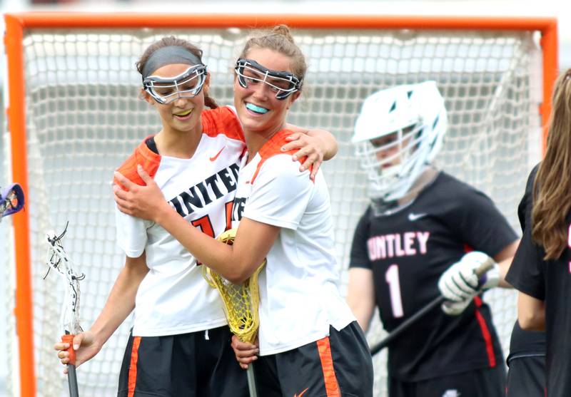 Crystal Lake Central United’s Addie Bechler,left, and Fiona Lemke celebrate a goal against Huntley in IHSA Sectional Title Game action at Crystal Lake Central High School in Crystal Lake on Friday, May 30, 2025.