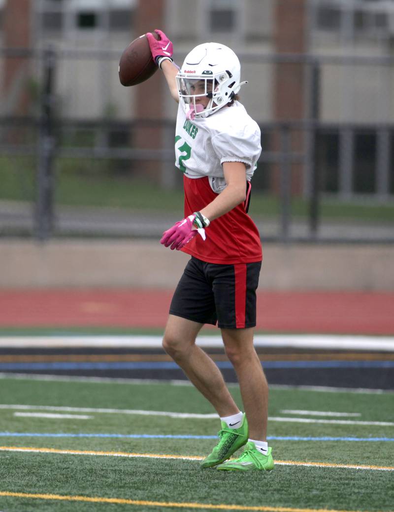 York’s Luke Mailander makes a catch during a practice at the Elmhurst school on Wednesday, Aug. 9, 2023.