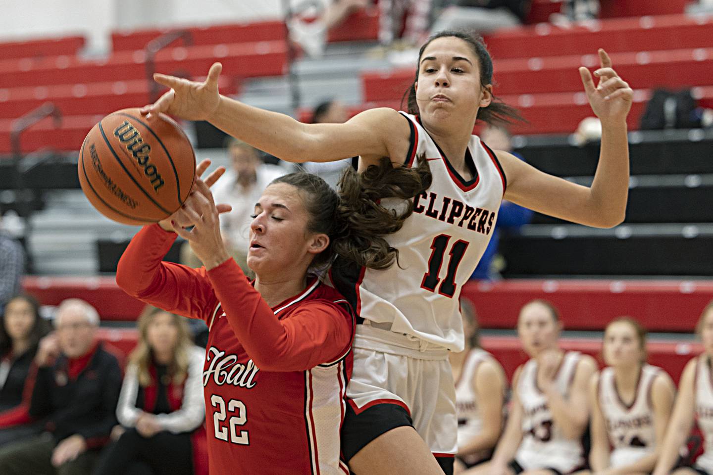 Amboy’s Tyrah Vaessen reaches for the ball over Hall’s Kennedy Wozniak Wednesday, Dec. 27, 2023 during the Amboy Holiday Basketball tournament.