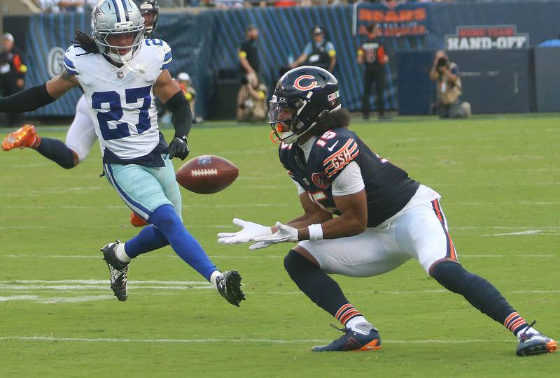 Chicago Bears wide receiver Rome Odunze makes a catch as Dallas Cowboys corner back Reddy Stewart approaches on Sunday, Sept. 21, 2025 at Soldier Field.