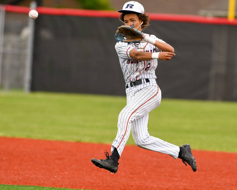 Romeoville's Justin Perez (2) makes an out at first base while taking on Yorkville during the regional game on Thursday May 29, 2025, held at Yorkville High School.