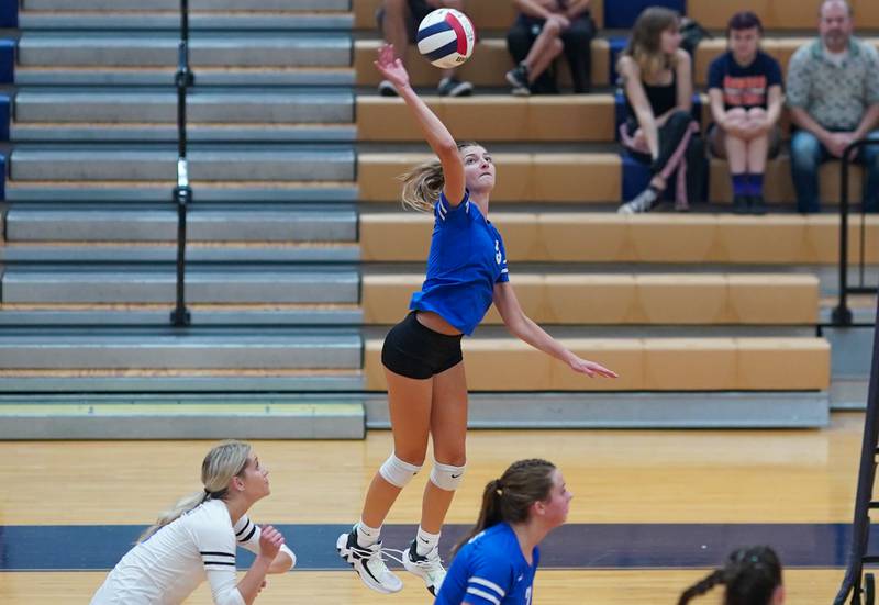 Rosary’s Clare McEniry (5) goes up for a kill against Oswego during a volleyball match at Oswego High School on Tuesday, Aug 29, 2023.