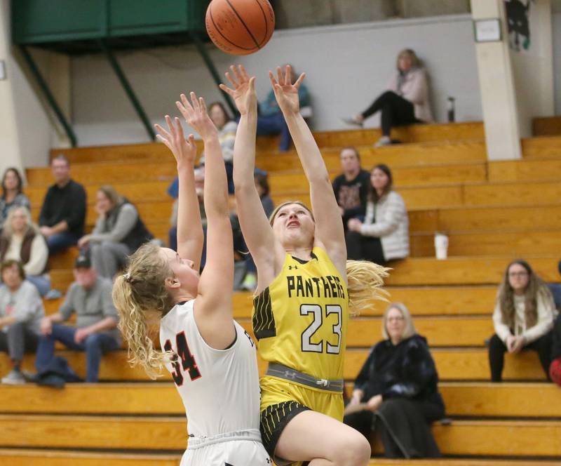 Putnam County's Salina Breckenridge shoots a shot over Raonoke-Benson'e Callie Kennell during the Tri-County Conference Tournament on Tuesday, Jan. 17, 2023 at Midland High School.