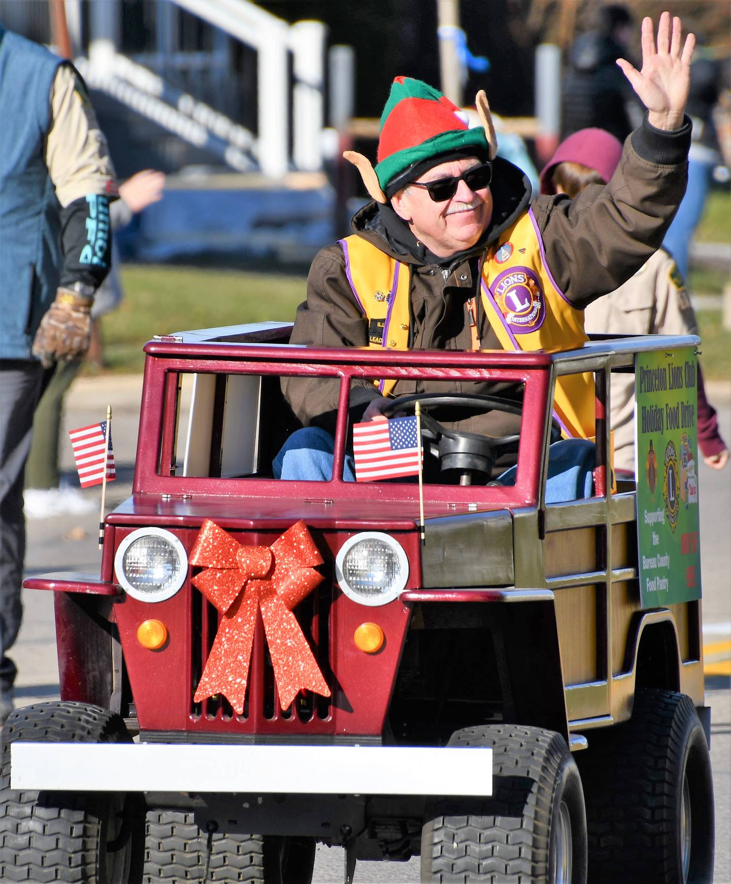 Scott Smith of the Princeton Lions Clubs leads the Christmas parade down Main Street in Princeton on Saturday.