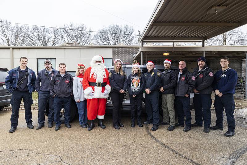 Rock Falls Fire and Police spent the afternoon Monday, Dec. 23, 2024, delivering gifts, food and household items to 11 families in the city.