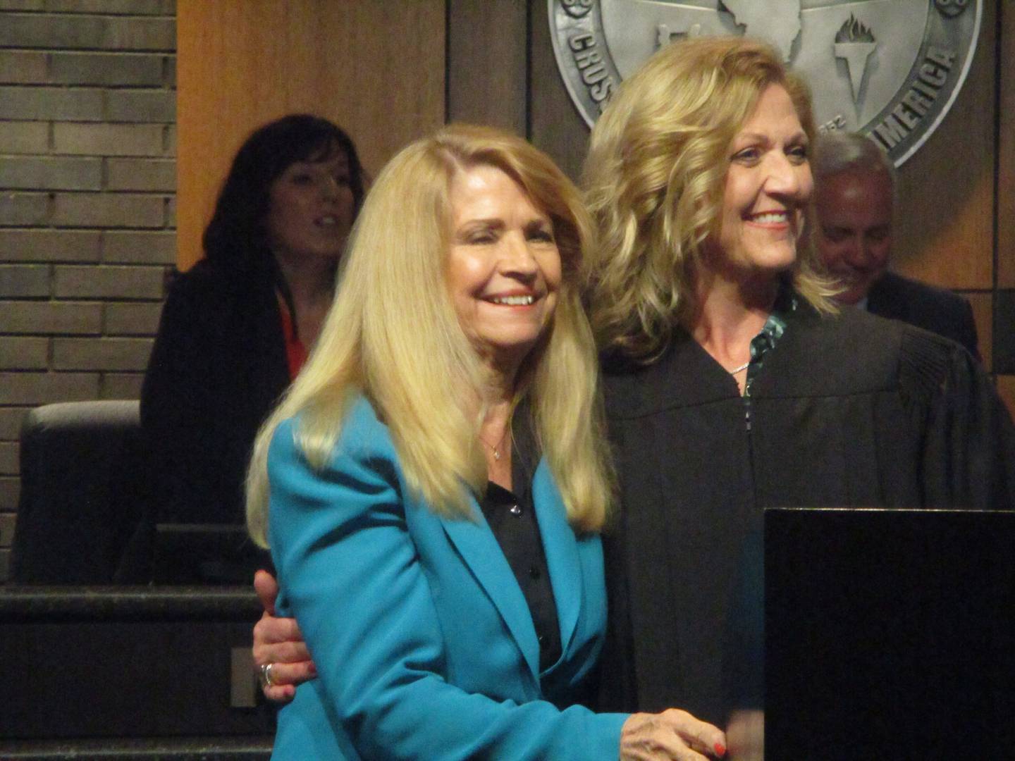 Joliet Councilwoman Jan Quillman (left) enjoys a moment with Illinois Supreme Court Judge Mary Kay O'Brien, who gave Quillman the oath of office Monday for her sixth term. May 5, 2025