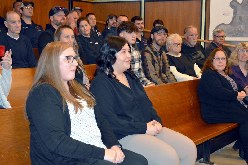 Whiteside County 911 dispatchers Tara Baumgartner, left, and Alexis Echebarria were honored during the March 19, 2024, Rock Falls City Council meeting for their lifesaving work during a Feb. 14 emergency call.