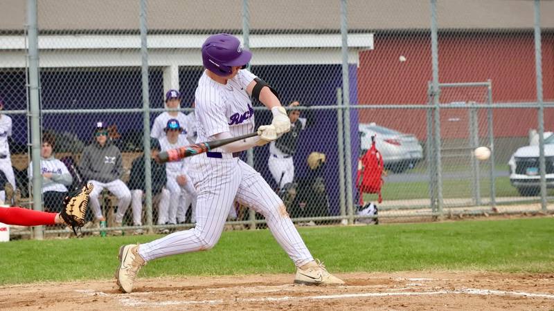 Rochelle's Marcus Hansen singles in a run during the Hubs' game with Streator.