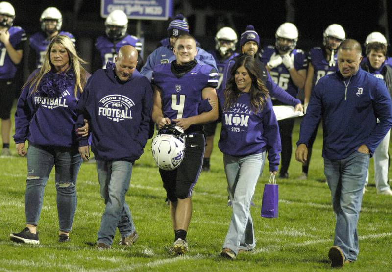 Landon Knigge is escorted by members of his family at Senior Nigt. Genoa-Kingston traveled to Dixon to take on the Dukes. The game took place on Dixon's Senior Night, October 24th, 2025