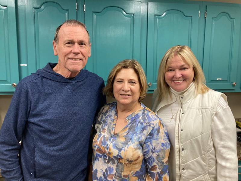 (From left) Tom Rooney, Illinois Valley Public Action to Deliver Shelter board member; Carol Alcorn, executive director; and Board President Gerilyn Hocking pose after an announcement the homeless shelter received a $1 million grant from the Federal Home Loan Bank/Chicago.