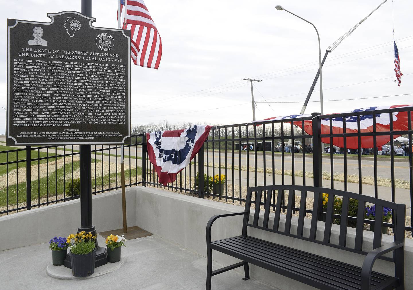 The historical plaque in honor of Steve Sutton who was shot and killed during a 1932 labor riot in Marseilles.