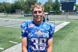 Newman’s Daniel Kelly takes in final football action at Shrine Game