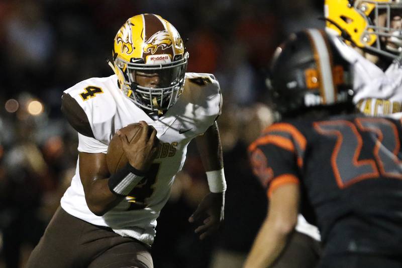 Jacobs's Nasir Canty runs the ball against Crystal Lake Central during their week 2 football game on Friday, Sep. 3, 2021 at Crystal Lake Central High School in Crystal Lake.