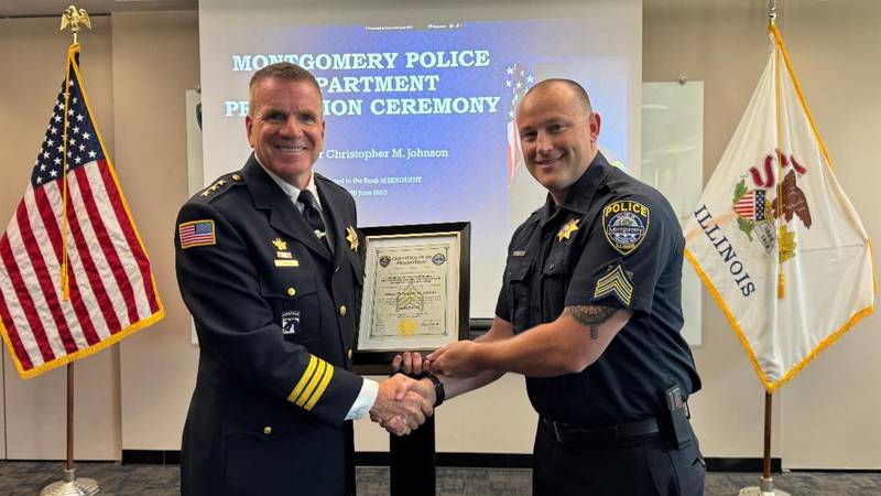 Montgomery Chief of Police Phil Smith (left) with Montgomery police Sgt. Chris Johnson.