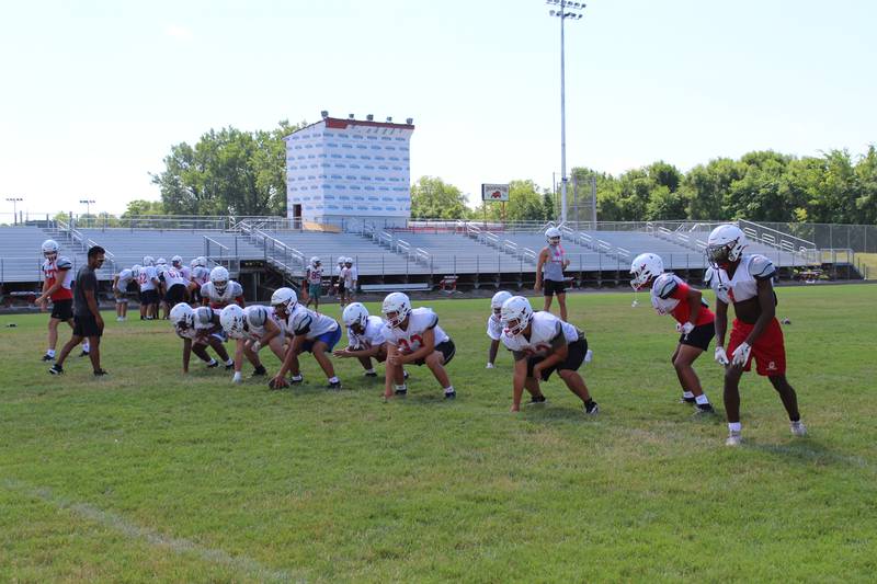 The Streator Bulldogs football team runs through drills Wednesday, July 16, 2025, during practice at Doug Dieken Stadium in Streator.