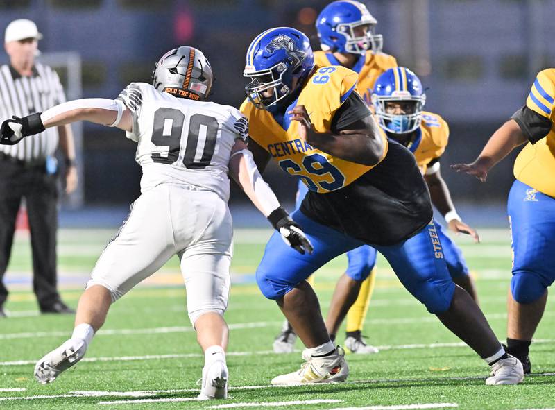 Joliet Central's Jordan Stepney blocks Minooka's Zachary Puracchio during a non-conference game on Friday, Sep 13, 2024 at Joliet. (Dean Reid for Shaw Local News Network)