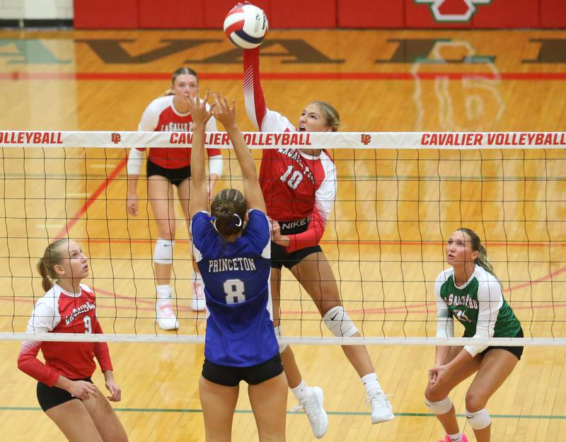 L-P's Kelsey Frederick sends a spike past Princeton's Keighley Davis on Tuesday, Aug. 26, 2025 in AJ Sellett Gymnasium at L-P High School.