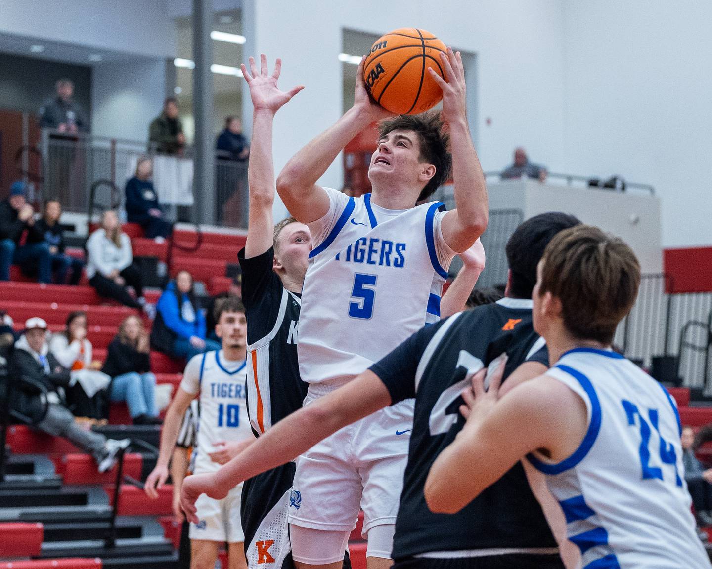Jack Oester (5) of Princeton pulls up for midrange shot during the Colmone Classic on Saturday, December 13, 2025 at Hall High School in Spring Valley.