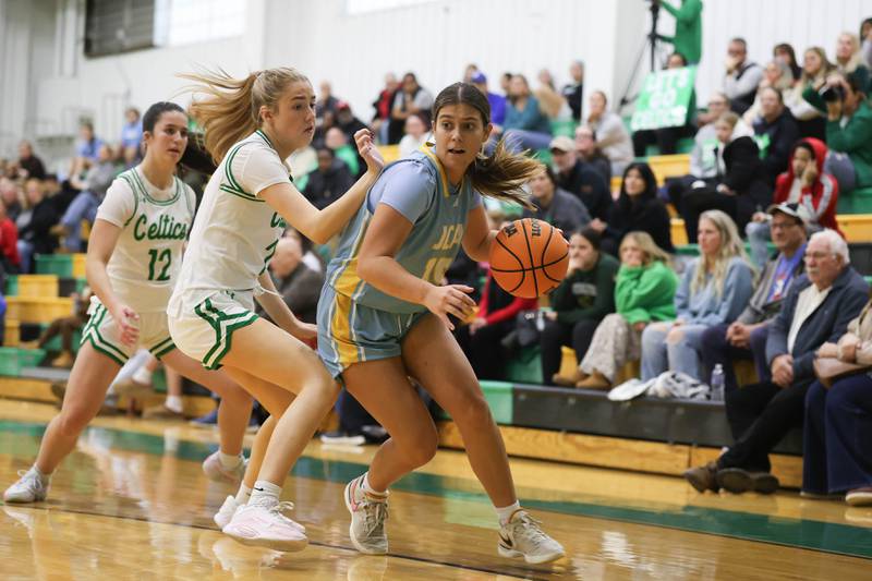 Joliet Catholic’s Allison Lesters makes a move to the baseline against Providence on Saturday, Dec. 5, 2025 in New Lenox.