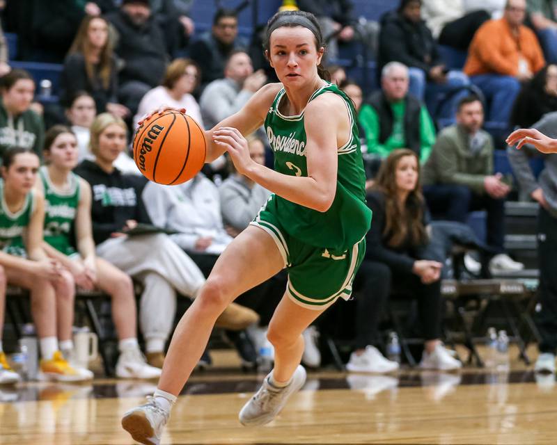 Providence Catholic's Molly Knight (3) drives to the basket during their basketball game between Providence Catholic at Joliet Catholic. Feb 11, 2025 in Joliet.