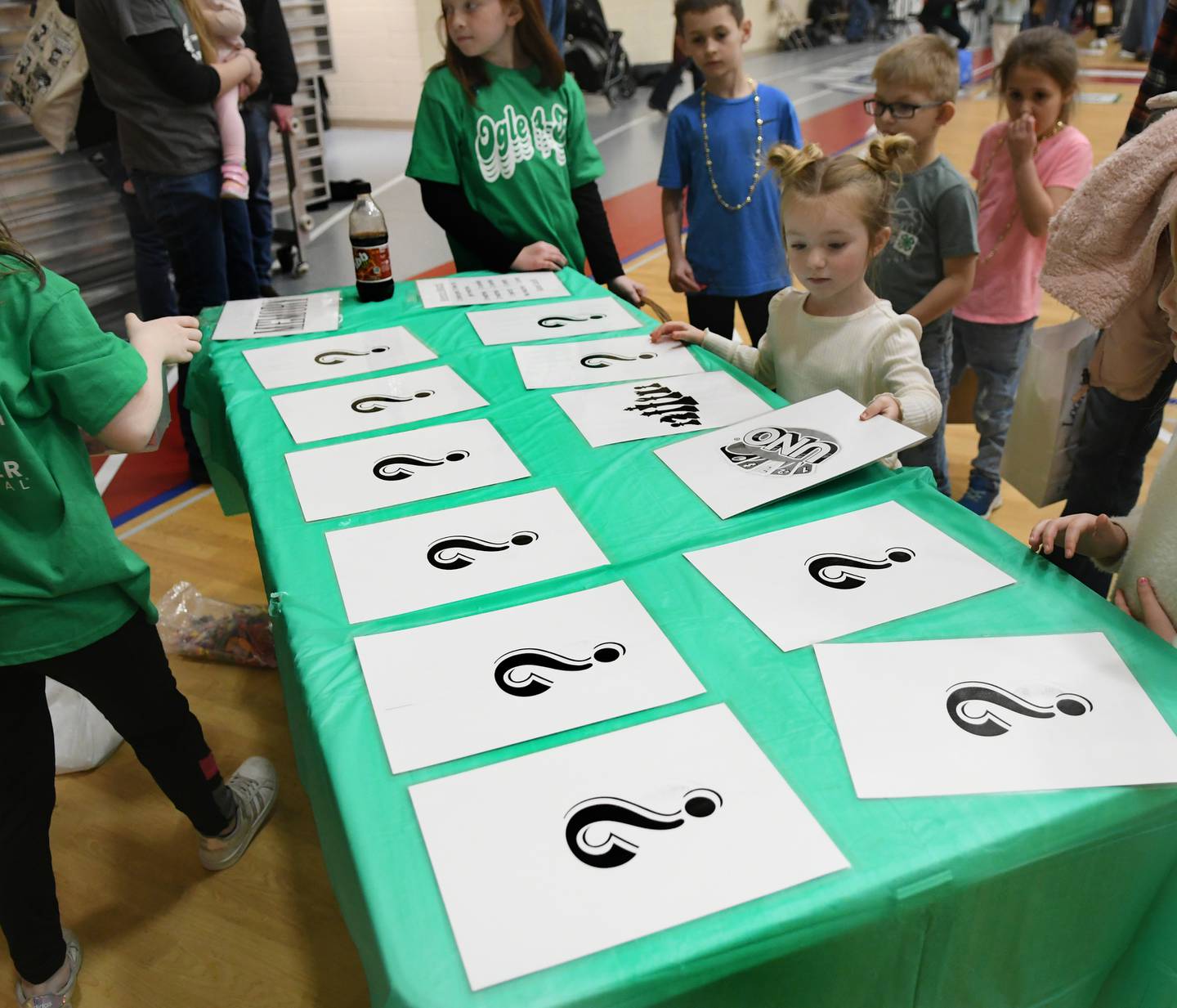 Madilyn Deraitus, 4, of Forreston, plays a memory game at the Carefree 4-H Club's game at the 4-H Penny Carnival on Saturday, March 18.