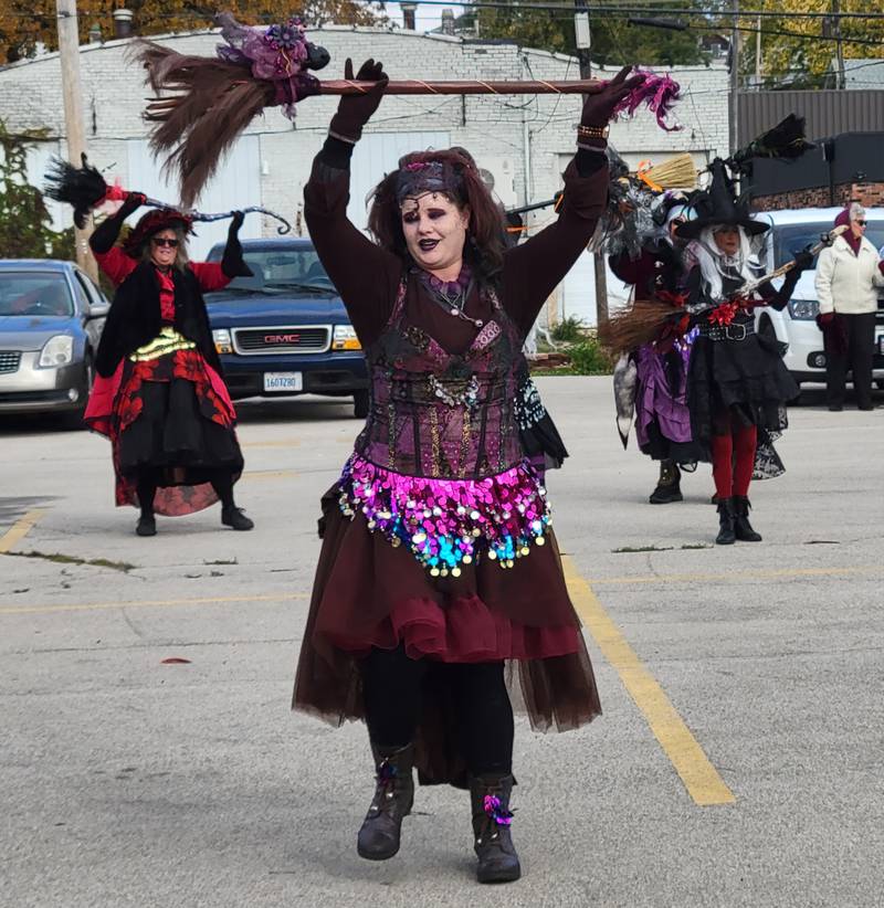 The Hocus Pocus Hags enjoy a dance moment at Saturday's La Salle Halloween Celebration.