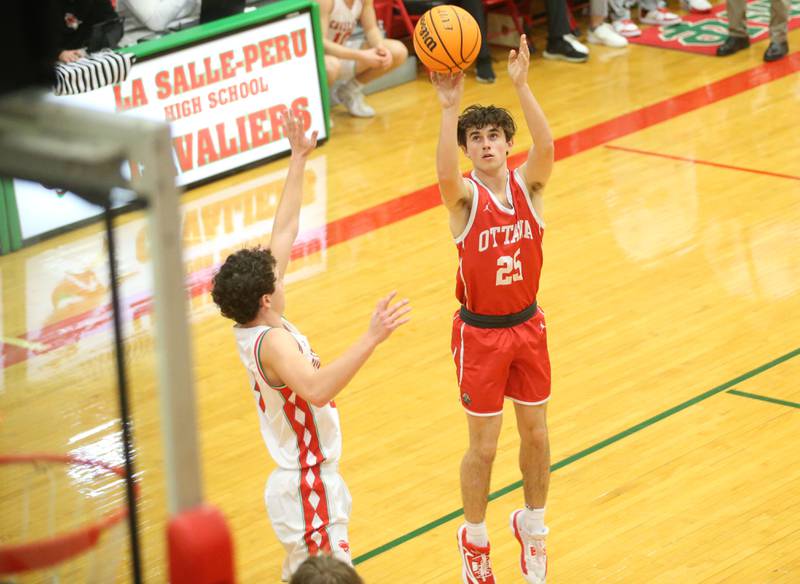 Ottawa's Lucas Farabaugh shoots a jump shot over L-P's Mikey Hartman on Friday, Feb. 7, 2025 in Sellett Gymnasium at L-P High School.