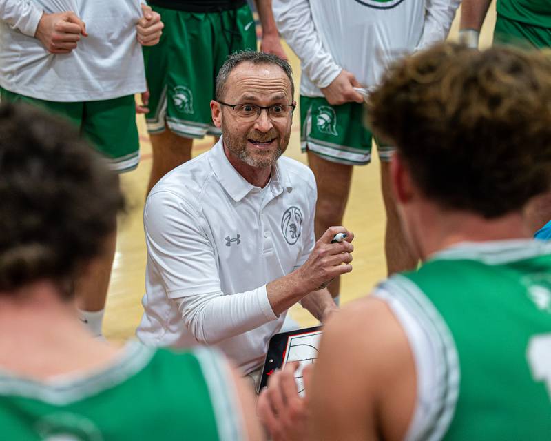Dwight's Head Coach Jeremy Connor talks to team during full timeout in game against Marquette on Saturday, Feb. 21, 2026 at Marseilles Elementary School.