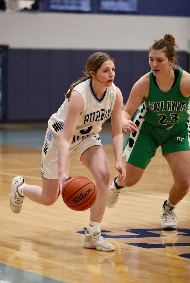 Bureau Valley senior Kate Salisbury pushes the ball up the floor against Rock Falls' Claire Bickett in Saturday's regional game at the Storm Cellar.