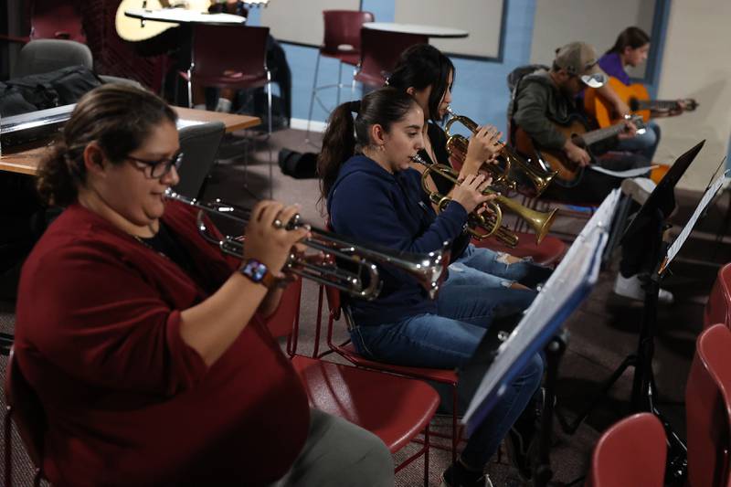 Mariachi de Joliet, a community Mariachi band, horn section practices for an upcoming fundraiser performance at the Rialto Square Theatre in Joliet.